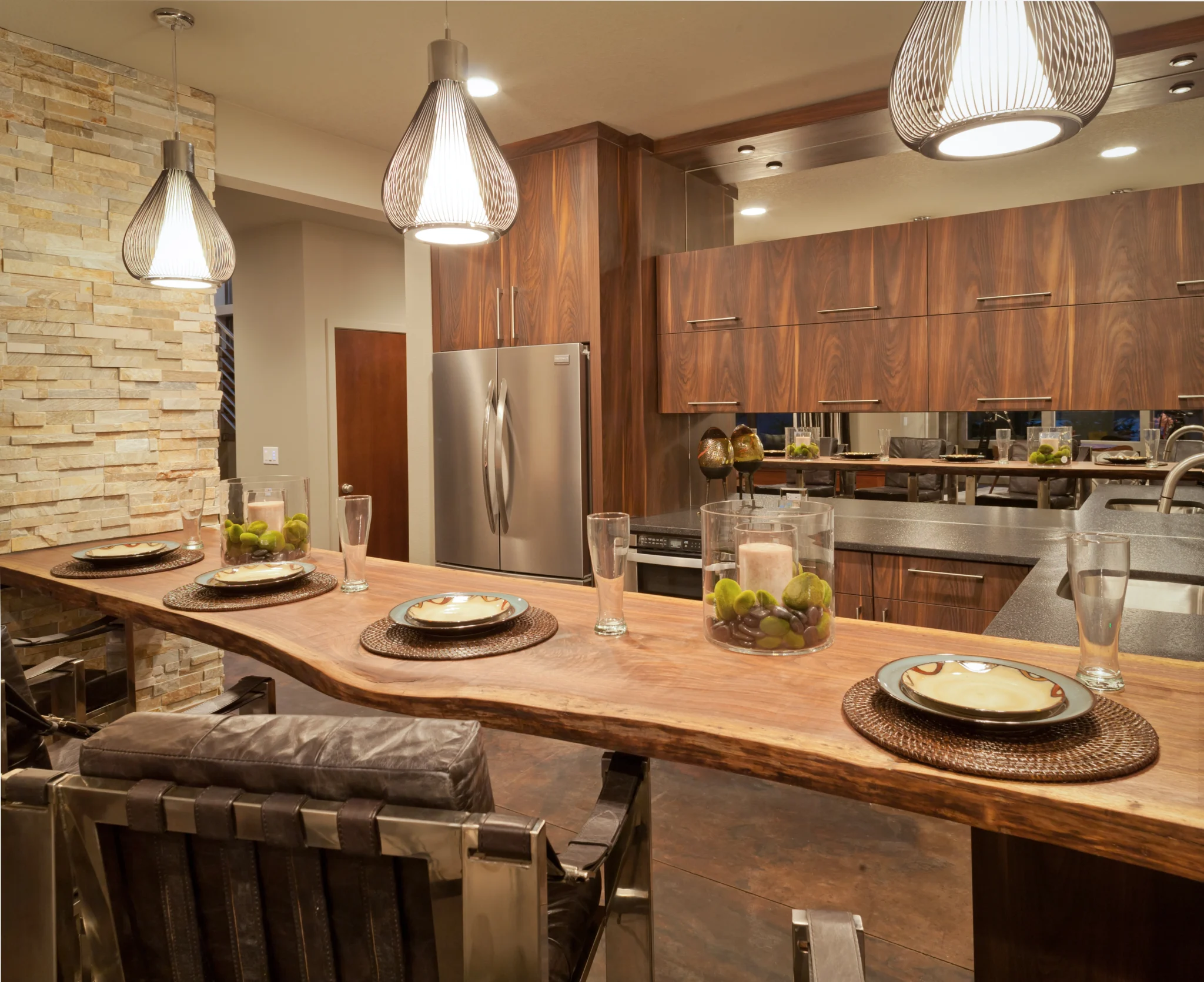 Stunning dining room lights above a bar in a kitchen